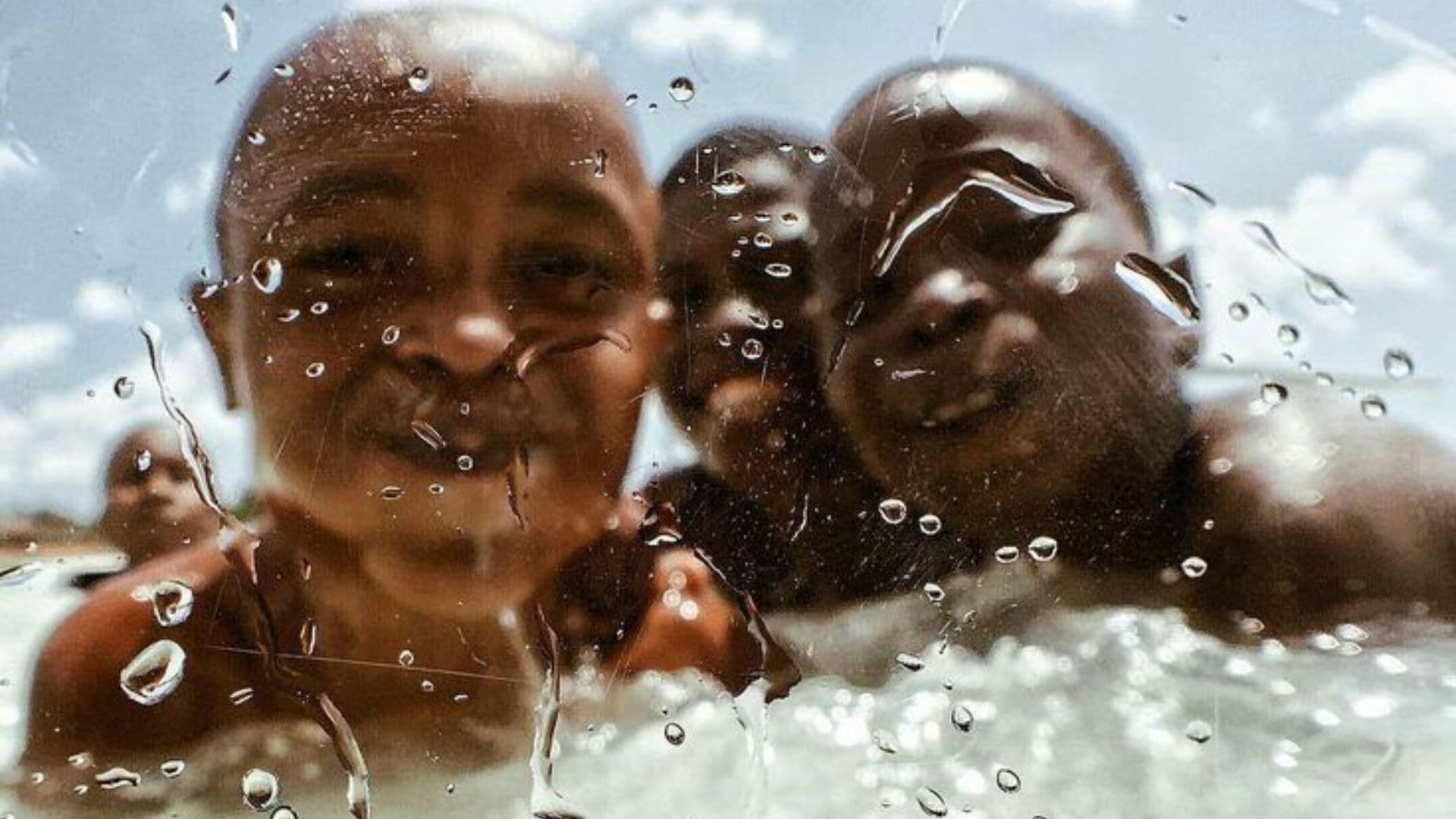 Boys swimming together